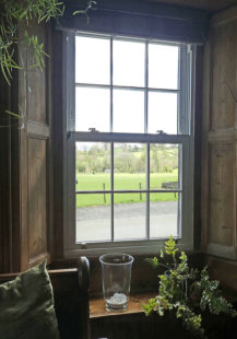 The window installers took great care maintaining the original pine shutters and window framing 